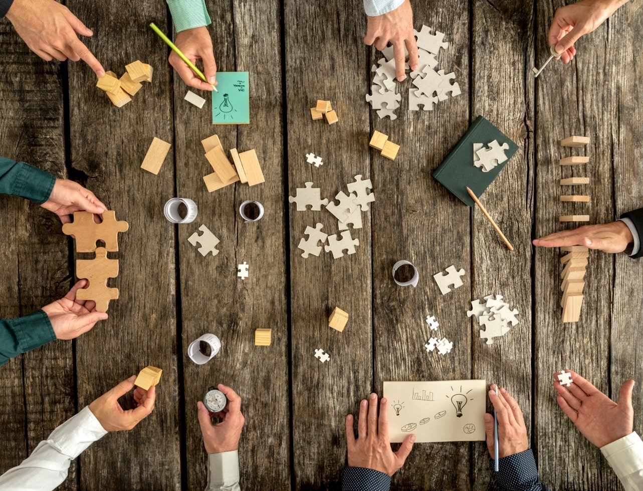 Decovision mission represented through team collaboration and problem-solving, reflecting quality, teamwork, and shared purpose